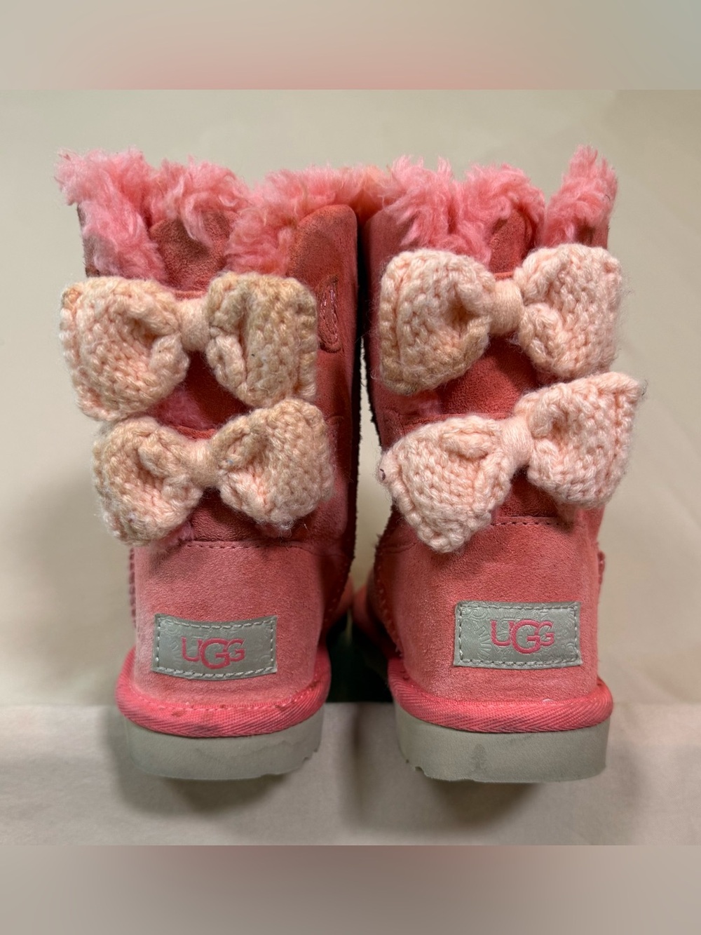 UGG Kids Girls Pink Bailey Knit Bow Shearling Boots, Size 13.